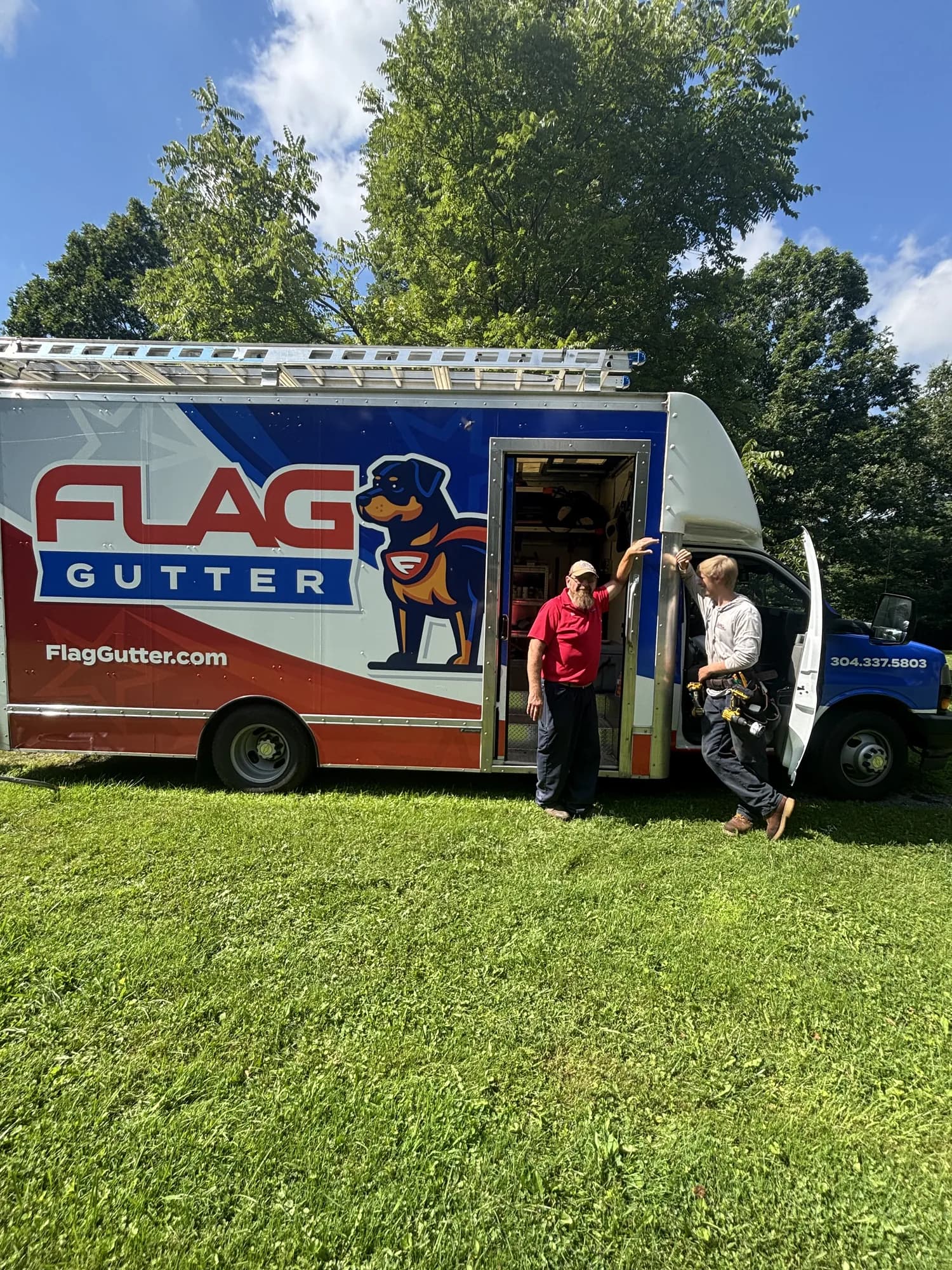 The Flag Gutter truck on a job site